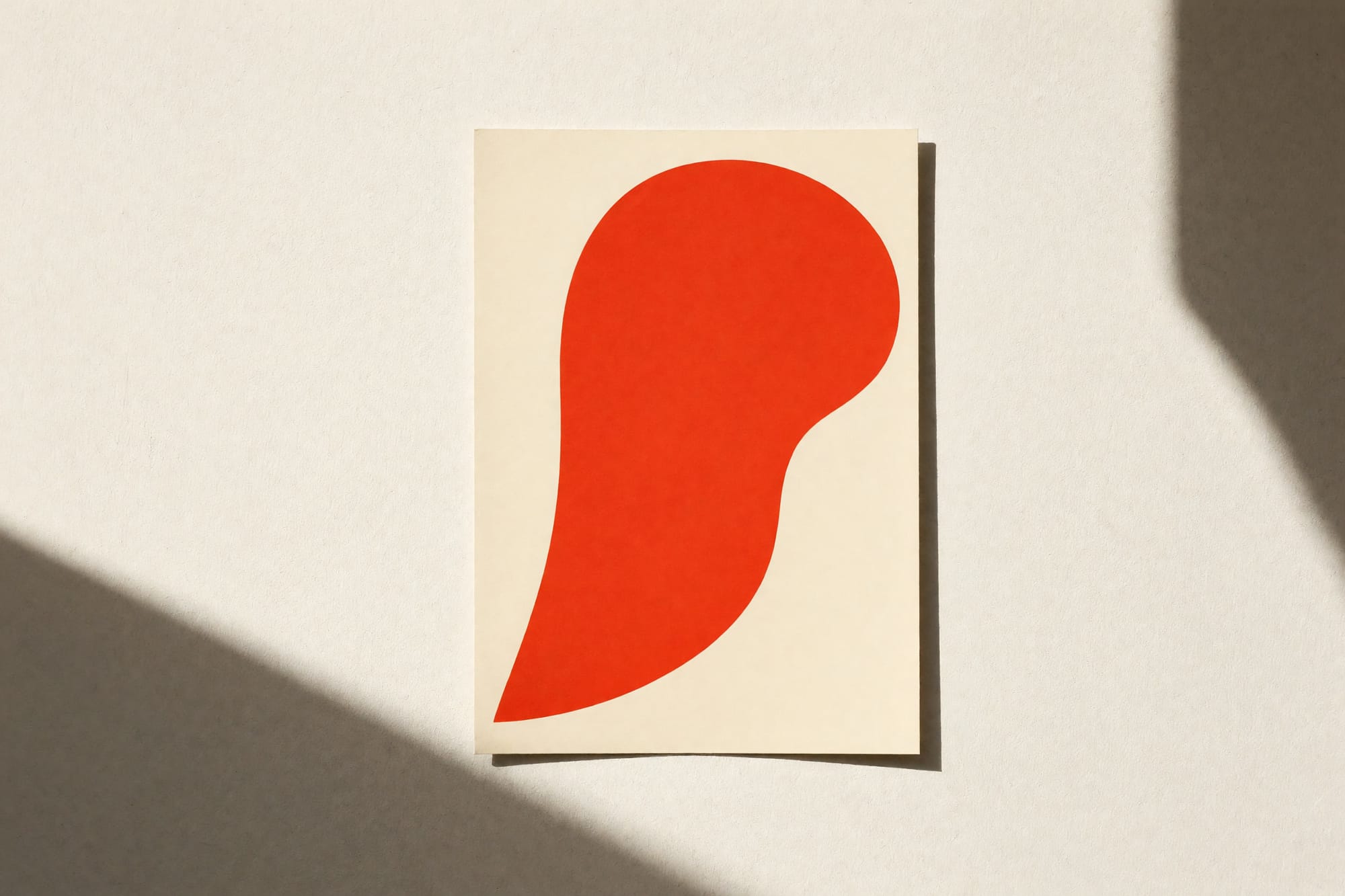 A single vivid poster alone on a large plain wall